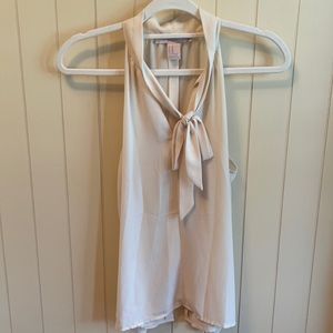 Cream sleeveless bow tie blouse